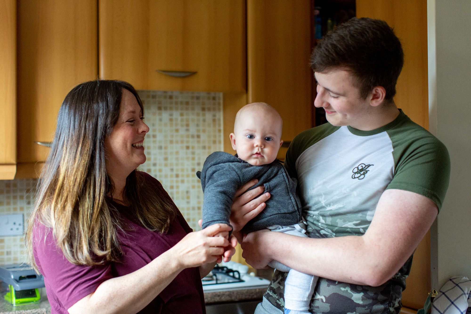 young couple with their baby